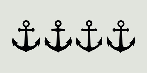 Four black nautical anchors arranged in a row on a light background