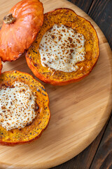Baked Hokkaido pumpkins filled with beef, tomato sauce, melted mozzarella