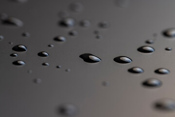 waterproof surface completely wet, part of the phone covered with drops of water