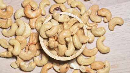 Delicious Roasted Cashew Nuts on a Wooden Table