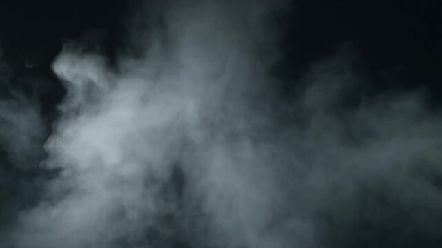 Dramatic fog rolling in under a dark sky, perfect for atmospheric scenes and suspenseful storytelling in films and creative projects.