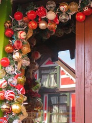 christmas decorations with pine and glass on the window 