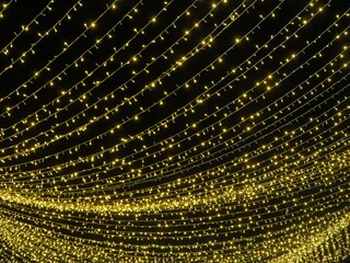 christmas golden twinkle lights against the night sky