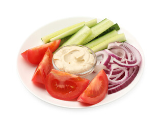 Different fresh vegetables and sauce isolated on white