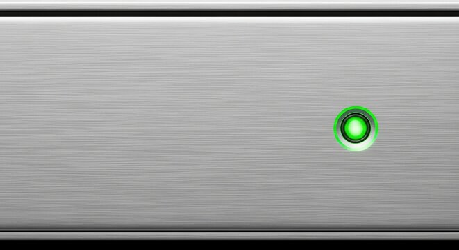 Silver server unit with active green led indicator. Data storage device in modern it infrastructure for cloud services and big data processing. Essential component for internet of things connectivity