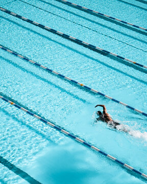 woman swimming in swimming pool