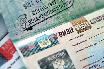 Fragment of Russian Federation visa in passport page close up. Concept of travel and tourism worldwide