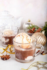 Affogato hot chocolate, on Christmas decorated background. Tasty hot chocolate or cocoa drink with vanilla ice cream scoops, copy space