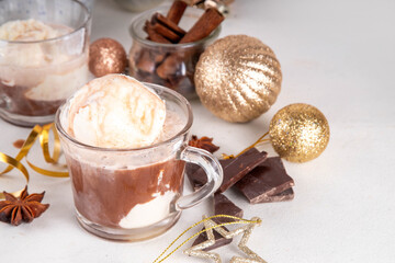 Affogato hot chocolate, on Christmas decorated background. Tasty hot chocolate or cocoa drink with vanilla ice cream scoops, copy space