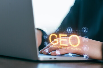 Enhancing digital presence through generative engine optimization on a laptop in a bright workspace