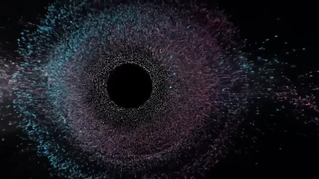 A swirling vortex of vibrant particles explodes outward against a dark backdrop, creating a mesmerizing cosmic effect.