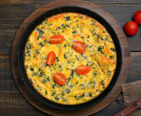 Omelet with herbs and fresh tomatoes