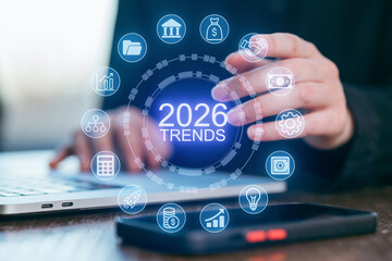 Trends for 2026 explored through technology and data analysis in a modern workspace