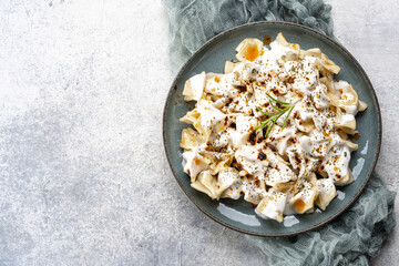 Traditional Turkish dish manti. Traditional dish made with handmade dough and minced meat.