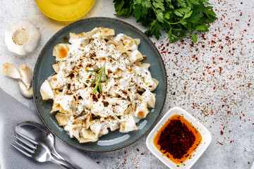 Traditional Turkish dish manti. Traditional dish made with handmade dough and minced meat.