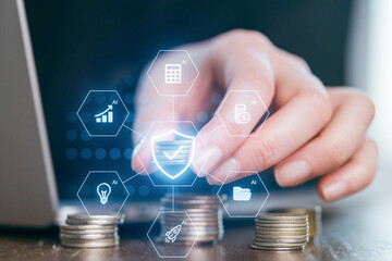 Person interacting with digital financial icons while managing coins on a desk