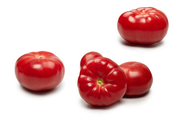 Red fresh tomato isolated on white background.