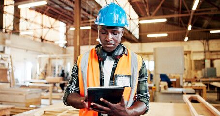 Carpenter, research and man with tablet, workshop and plan for furniture production on web or...