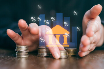 Creative financial strategy with hands manipulating money and data in a modern workspace during daytime