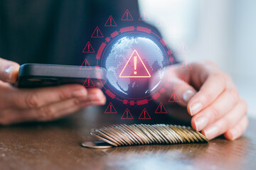 Alert signals on mobile device while person holds hair comb, highlighting digital security concerns in everyday life