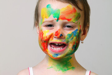 Colorful self-expression captured in a moment of joyful messiness.