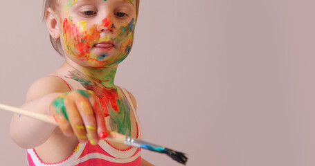 A child discovering art as a safe space for imagination and freedom. Copy space.
