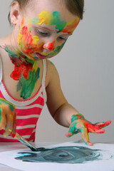 Childhood creativity expressed through bold, playful strokes of paint.