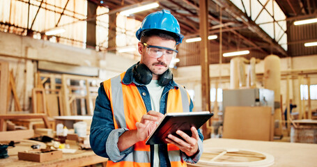 Carpenter, online and man with tablet, workshop and plan for furniture production on web or...