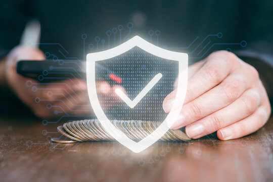 Digital security concepts with smartphone and coins showing online safety measures in modern banking practices