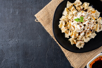 Traditional Turkish dish manti. Traditional dish made with handmade dough and minced meat.