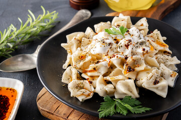 Traditional Turkish dish manti. Traditional dish made with handmade dough and minced meat.