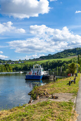 Fototapeta premium Boat docking on Moselle River in Grevenmacher