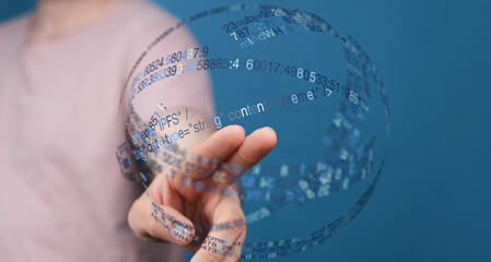 Abstract technology concept with a hand interacting with a digital data sphere, representing information, network, and internet conce