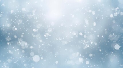 Fototapeta premium Abstract winter background with soft blue tones and sparkling bokeh lights.