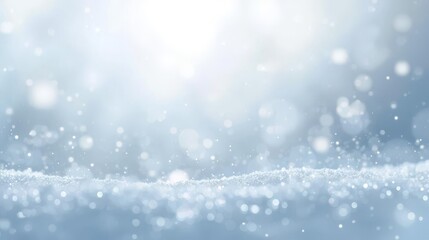 Abstract winter background with sparkling snow and bokeh lights.