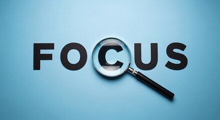 Magnifying glass focusing on the letter c in the word focus displayed on a light blue background for emphasis