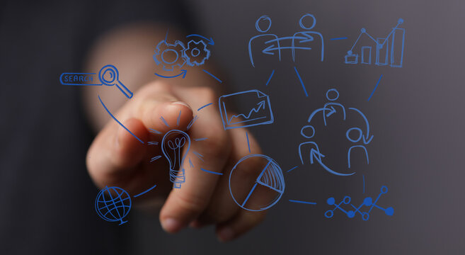 Hand touching a digital business concept. Idea, innovation, development, and data analysis symbols. Ideal for business, finance, and technology