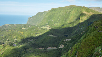 Atlantic coast of Flores Island with green cliffs and deep valleys, Azores, Portugal