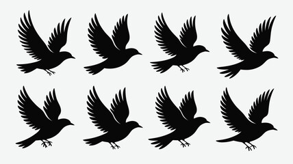 Silhouetted birds in flight a vector illustration perfect for logos tattoos or graphic design elements