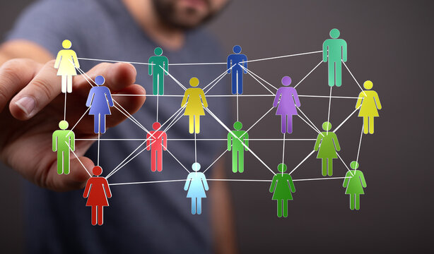 Concept of connection, teamwork, networking, social media, community and interaction. Digital figures represent - Powered by Adobe