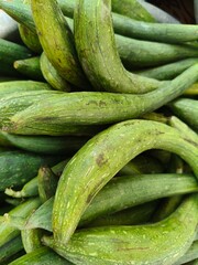 Close u shot of pile of fresh Luffa open sell in Indian market.