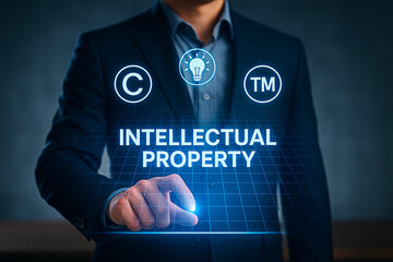A man interacting with Intellectual Property for the concept of business.
