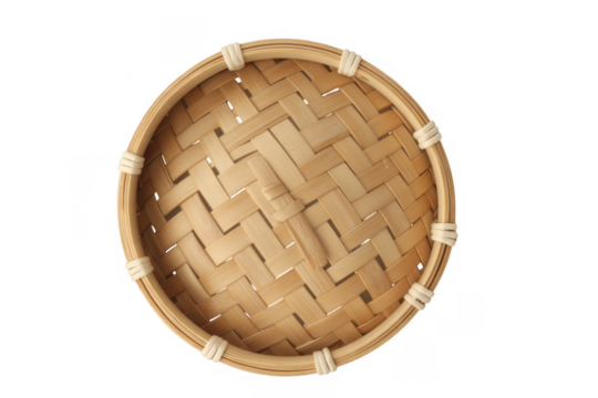 Round woven bamboo basket with white cord accents isolated on a transparent background