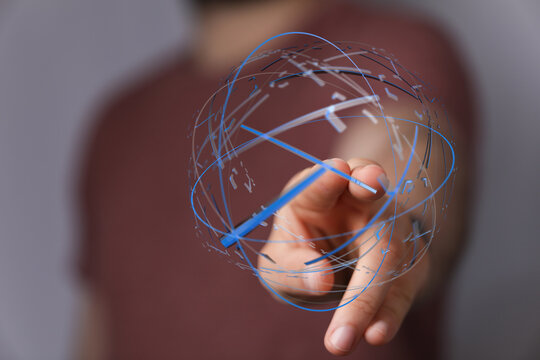 Person pointing at a digital globe, representing connection, future technology, and global network. Ideal for concepts like internet, data, and