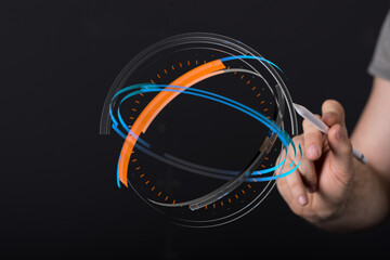 Hand touching a futuristic digital interface with glowing lines and patterns. Illustrating concepts like technology, innovation, and