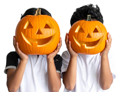 Pair of kids playfully hiding their faces behind intricately carved Halloween pumpkins, enjoying festive autumn celebrations, isolated on a transparent background, PNG