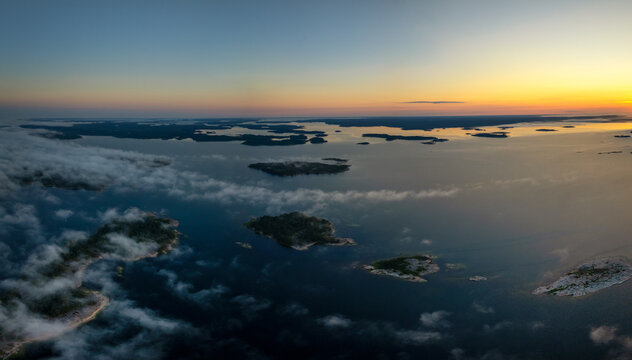 aerial panorama view of a beautiful sunset over the skerries and islands of the Aland archipelago in the Baltic Sea