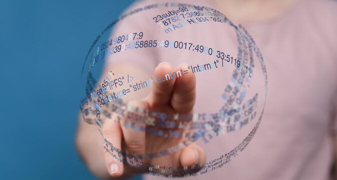 Abstract image of a hand touching a digital globe with code overlaid. Represents data, technology, innovation, and connection. Perfec - Powered by Adobe
