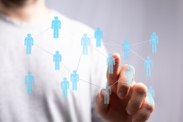 Person interacting with a digital network, concept of networking, communication, teamwork, and global connectio