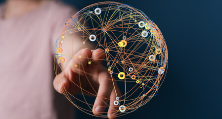 Hand touching network globe, represents global connectivity, digital world, technology and data. Shows connection and communication.